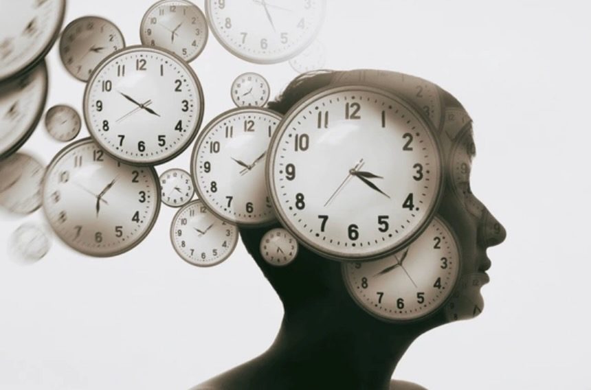 Silhouette with clocks — mental clarity and time